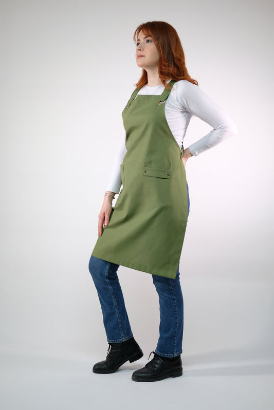 green apron for baking and cooking