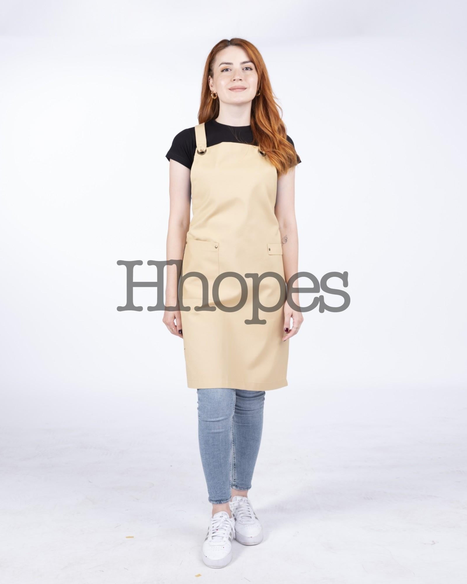 Close-up of soft mustard fabric with linen-like texture.