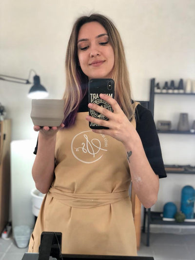 mustard apron with overlapping skirt panels